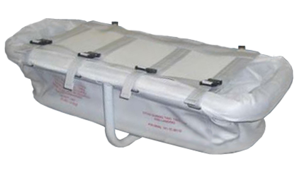 a white and grey Aviation Safety Systems Baby Bassinet