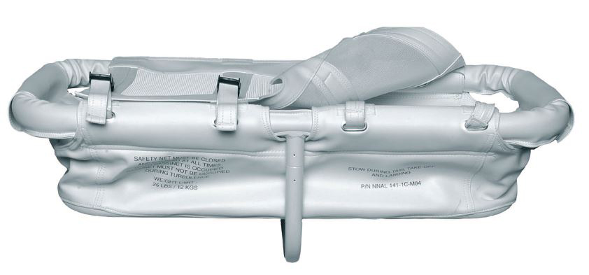 a white and grey Aviation Safety Systems Baby Bassinet