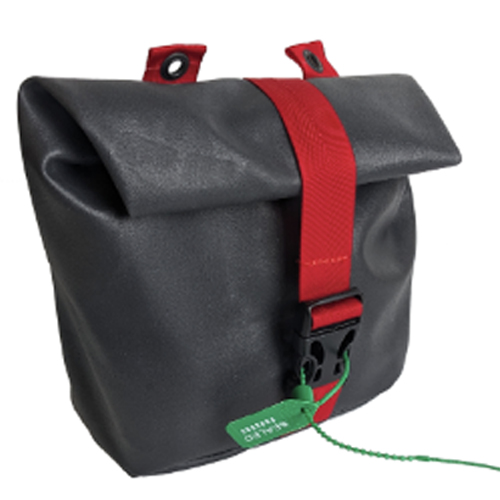 Black roll-top bag with a red strap and a green security tag indicating the tamper-free status of a Passenger Restraint Kit, closed and standing upright.